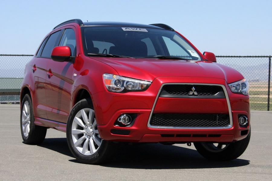  Mitsubishi Outlander Sport 2011 года  (фото 38 из 49)